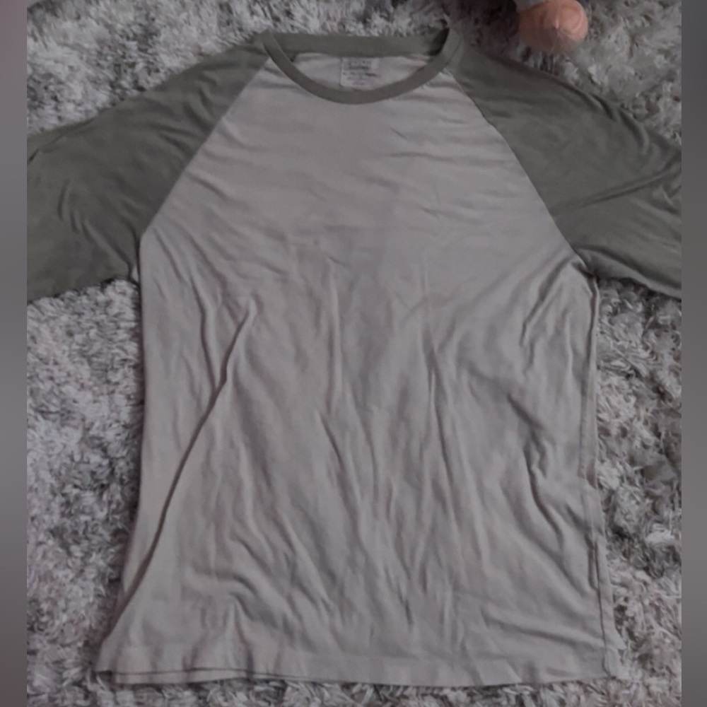 Cream and grey long sleeve shirt with a U-Shaped neckline.Size- L Brand- J. Crew